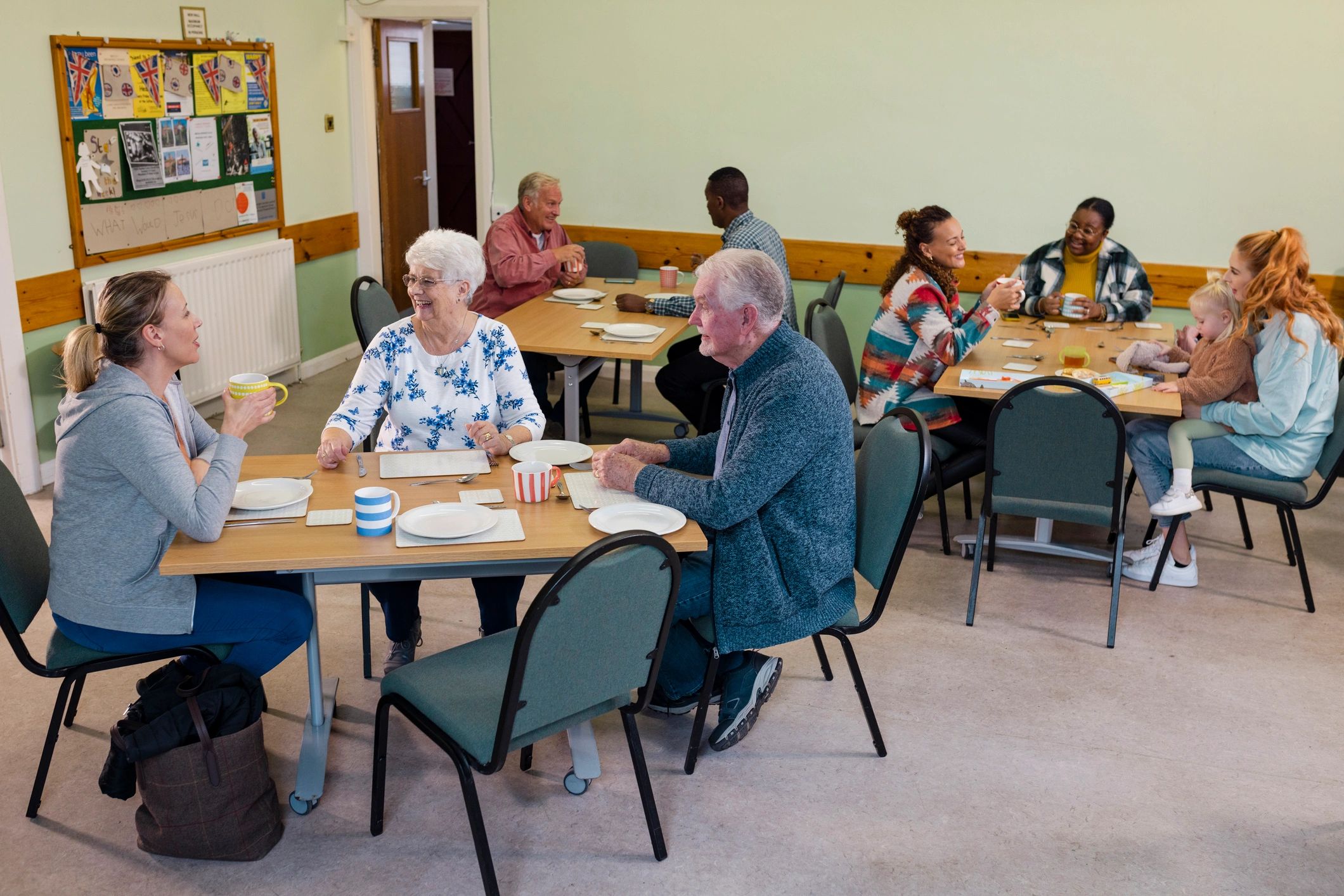 Community members gathering together in a welcoming space
